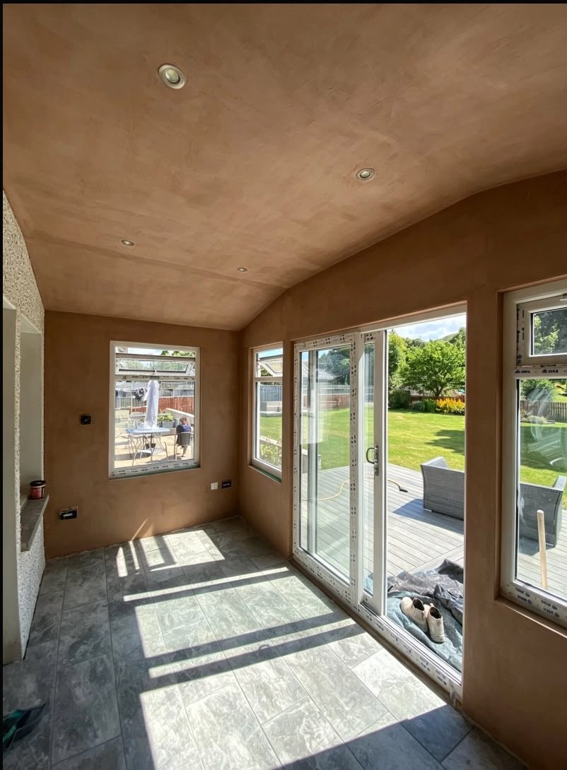 Garden room walls and ceiling plastered to a smooth finish